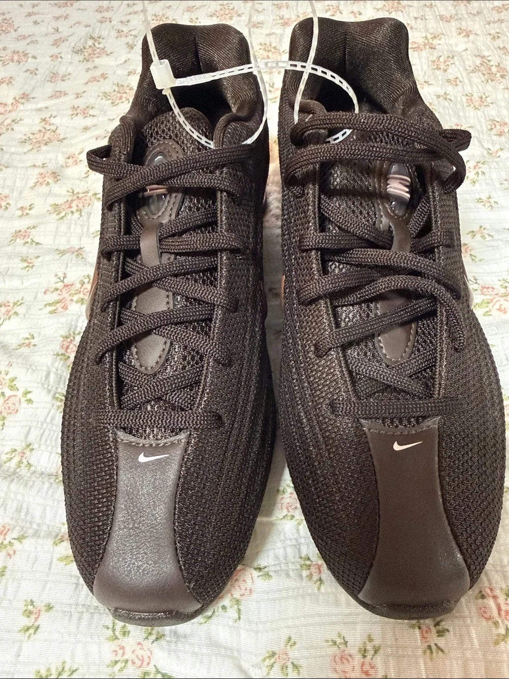 Nike Women's Dark Brown Athletic Shoes with Pink Midsole Accent